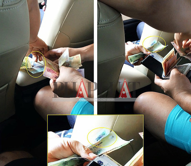 
Tài xế taxi dù 51G-054.17 tráo tiền của khách Hàn Quốc. (Ảnh cắt từ clip) Ảnh: N.TÂN
