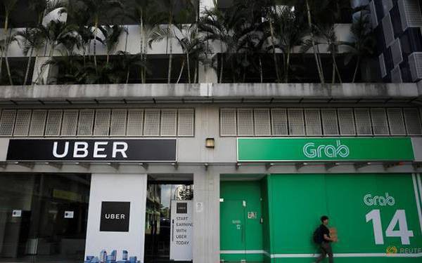 Grab và Uber bị Singapore phạt 9,5 triệu USD vì thương vụ sáp nhập