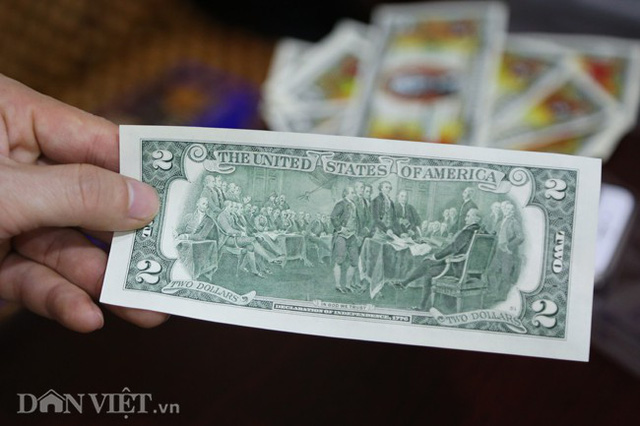 Tiền 2 USD in hình con heo đắt như tôm tươi trước Tết Kỷ Hợi 2019 - Ảnh 6.