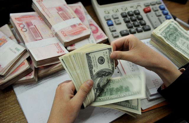 Trung Quốc phá giá nhân dân tệ: Tiền Việt Nam chịu “sức ép” lớn - 1