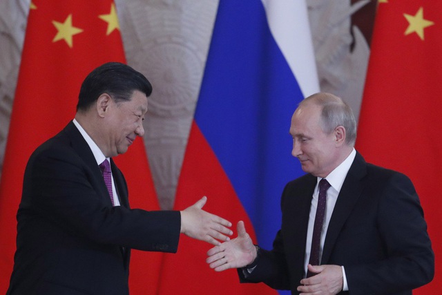Trung Quốc và Nga hợp tác giảm sự phụ thuộc vào đồng đô la Mỹ - 1