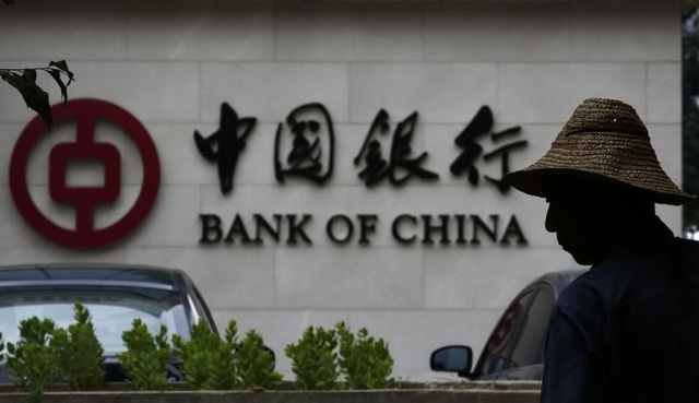 Vật lộn với làn sóng nợ xấu, Trung Quốc phải cầu cứu các công ty Mỹ? - 1