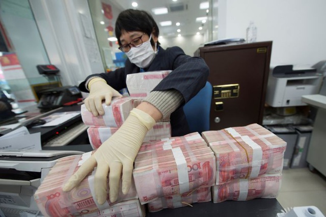 Trung Quốc “cách ly” tiền cũ, phát hành khẩn cấp tiền mới vì virus corona - 1