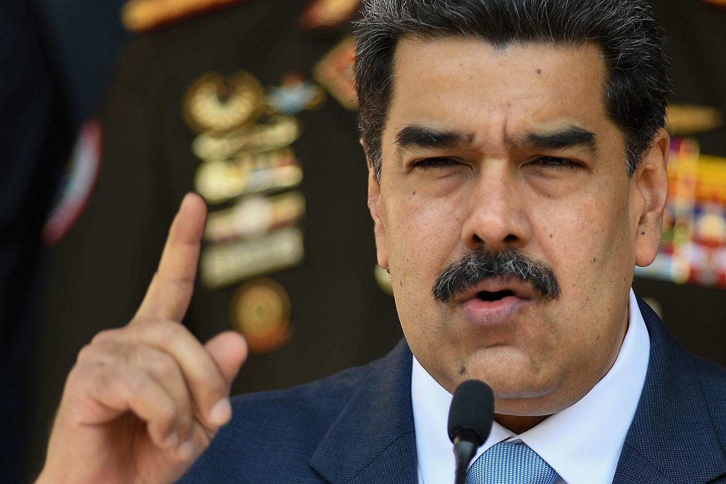 Description: Nicolás Maduro threatens 'racist cowboy' Trump in face of charges