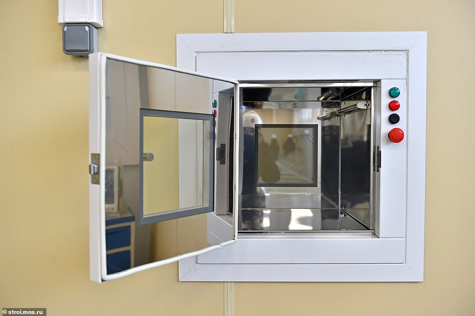 Pictured: A dumb waiter, allowing medical staff to transfer food to patients without coming into contact with them, at the new Moscow hospital