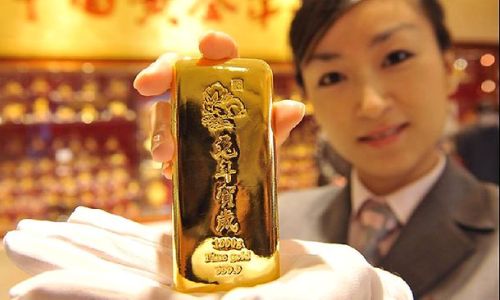 Trung Quốc tiêu thụ, sản xuất lượng vàng kỷ lục trong năm 2013