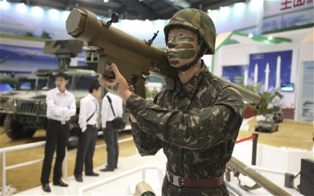 Các công ty vũ khí Trung Quốc ngày càng tích cực tham gia các triển lãm quốc phòng (Ảnh: EPA)