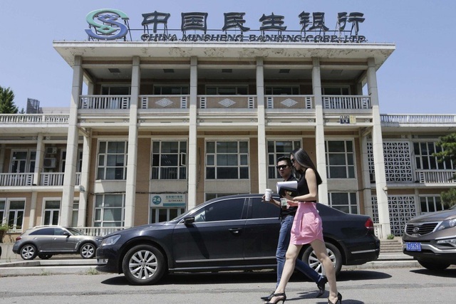 Giám đốc ngân hàng Trung Quốc lừa hơn 400 triệu USD để sống sang chảnh - 1