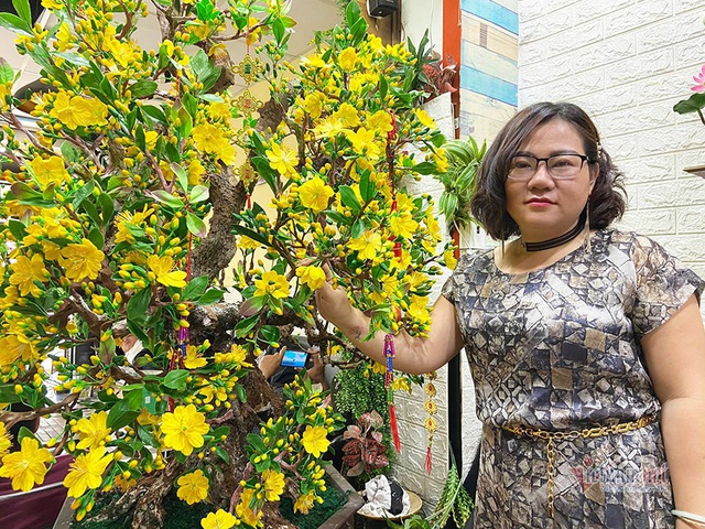 Bà chủ Sài Gòn dùng 35 kg đất sét làm cây mai cao 2 m chơi Tết - 4